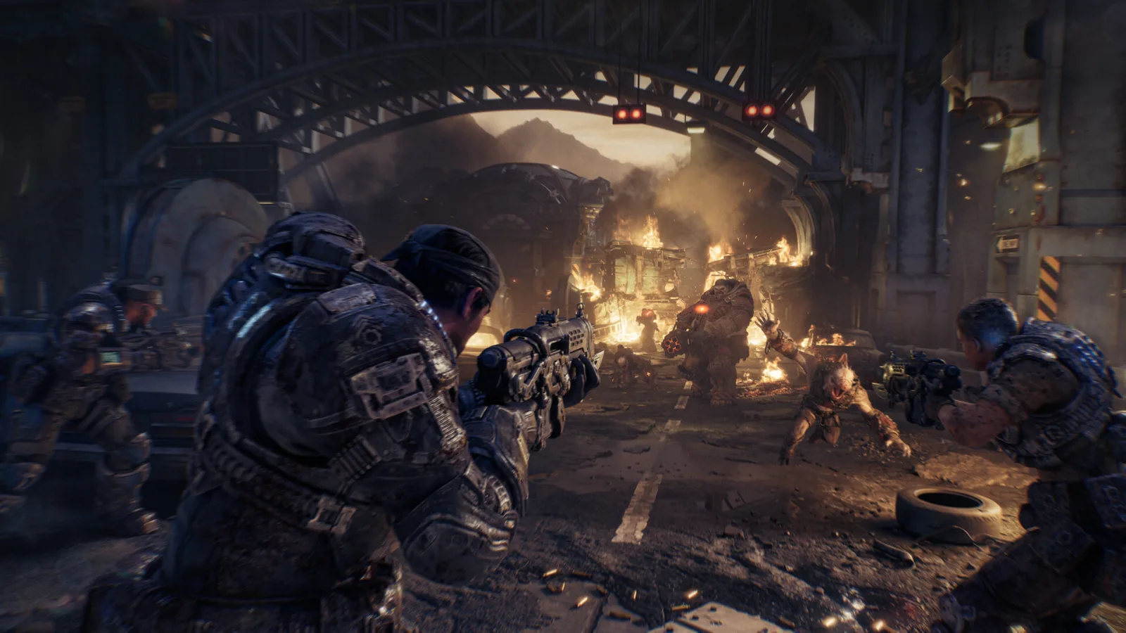 Xbox : un soldat de Gears of War: E-Day au combat dans une ville en ruines