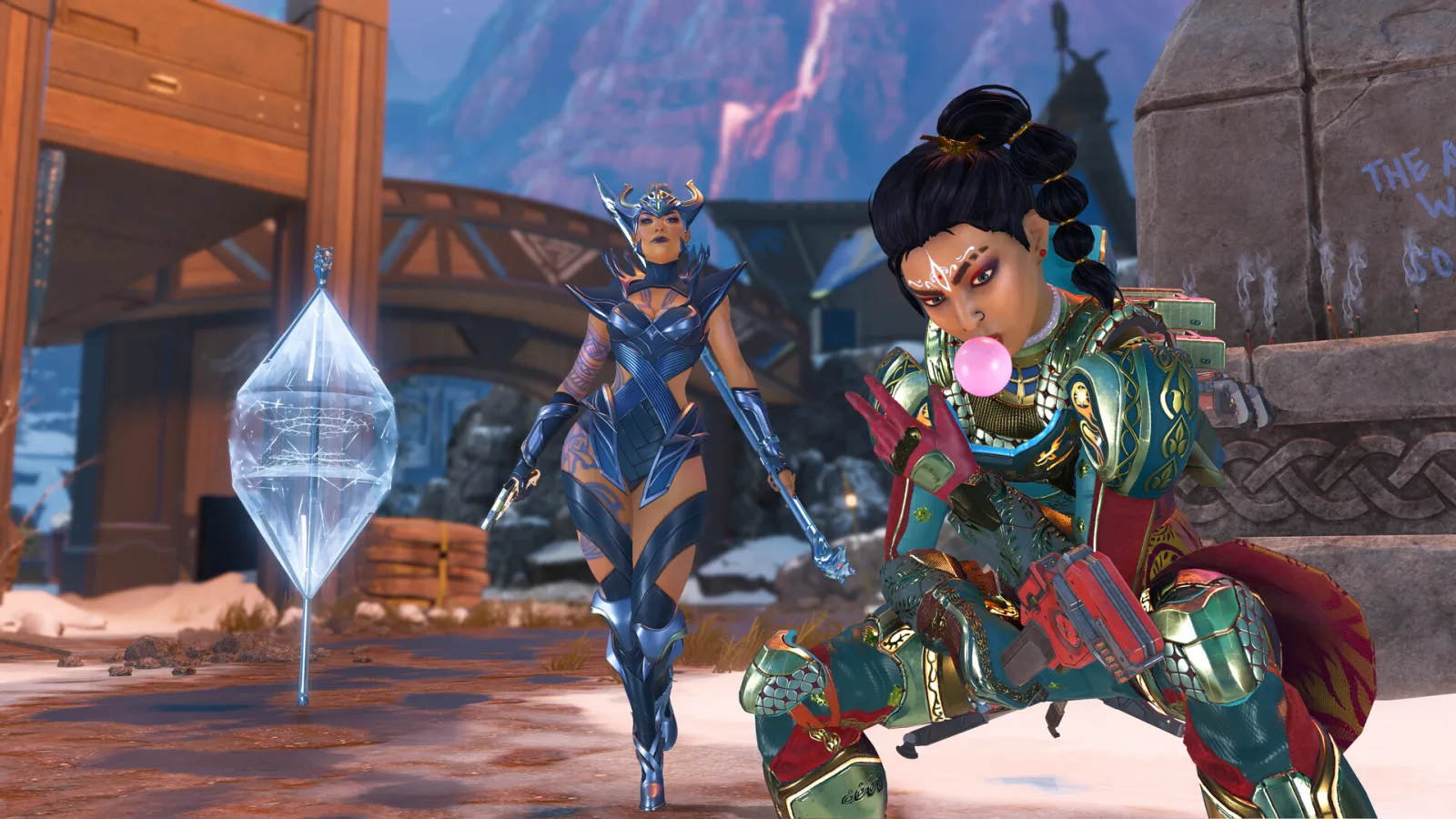 Apex Legends: two armoured legends posing beside a crystal