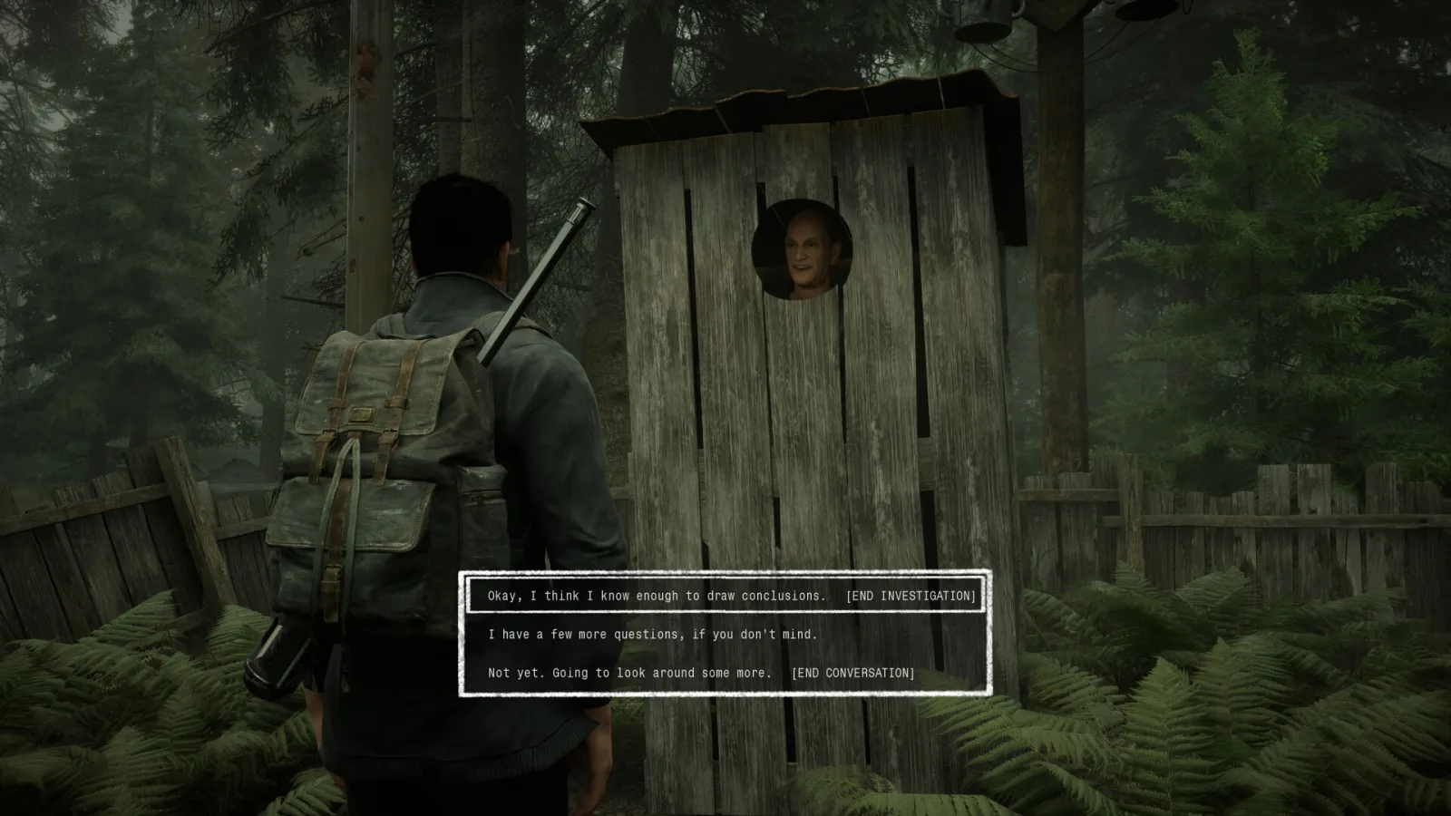 In The Pines, a man questions a stranger peering from a wooden outhouse